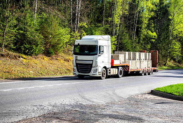 Jenis Truk untuk mengangkut Material Berat